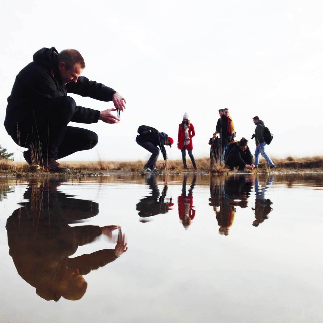 water reflection photography people